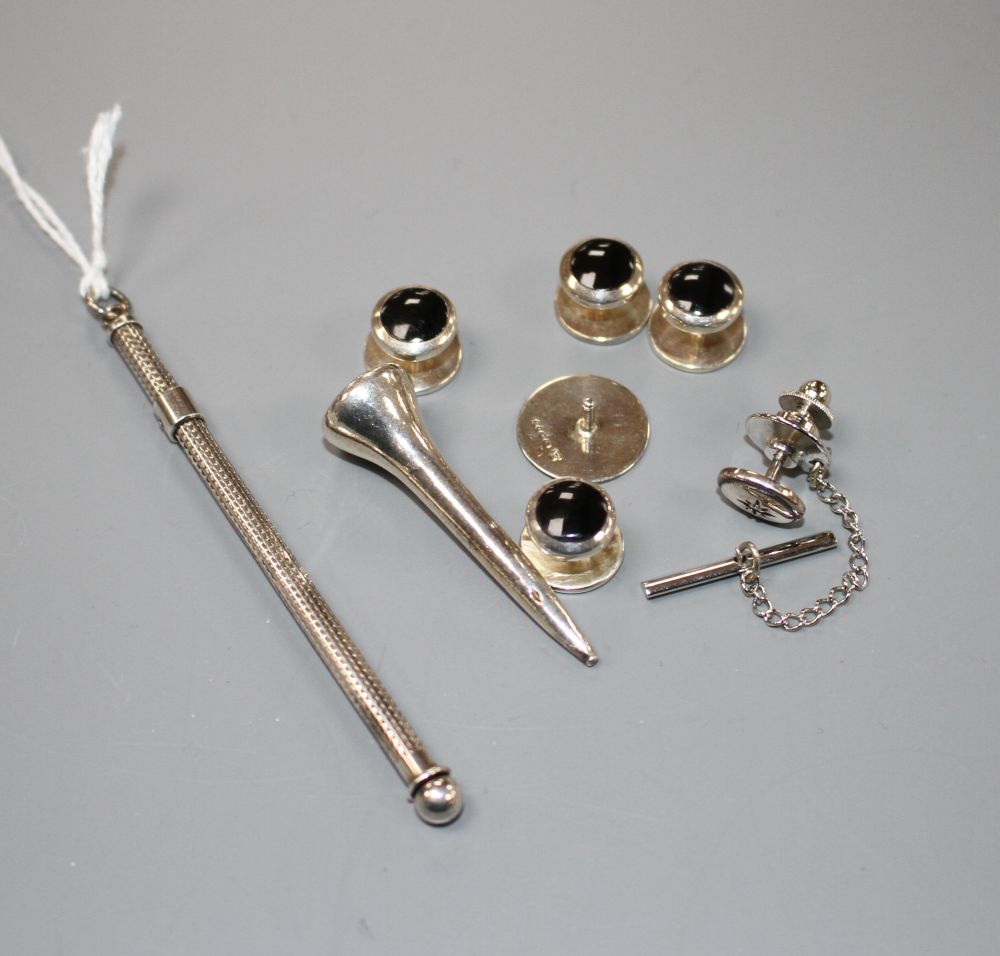 A modern silver swizzle stick, a similar propelling toothpick, five 925 dress studs, a modern silver golf tee and one other silver item